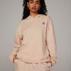 NEW SAVAGE X FENTY HOODED LONG-SLEEVE BACK PAGE GRAPHIC TEE SIZE: S